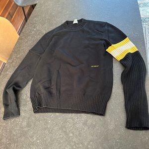 Calvin Klein knitted sweater with armband made in Italy, 205 W39 NYC collection